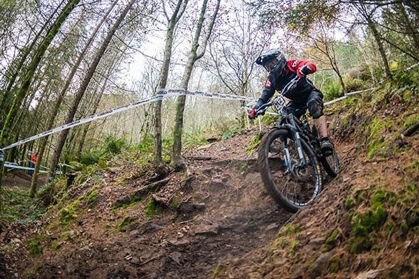 Lindsay tackling a tricky twisty descent 